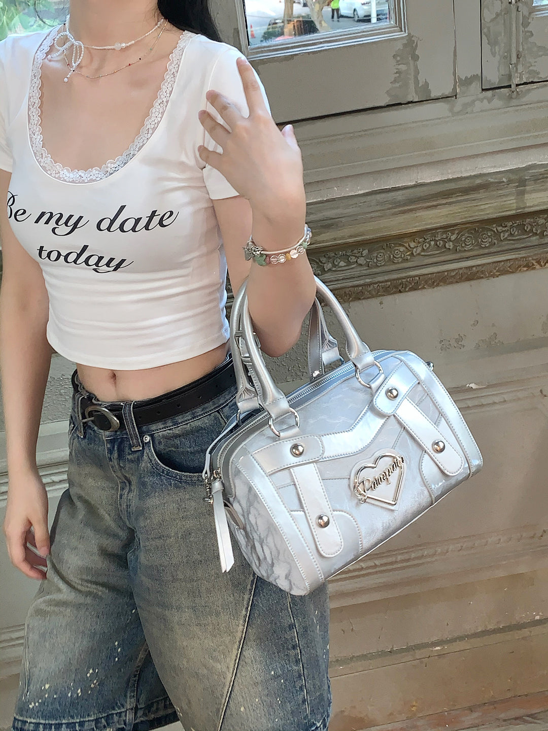 Chic Silver Metallic Handbag with Heart Emblem