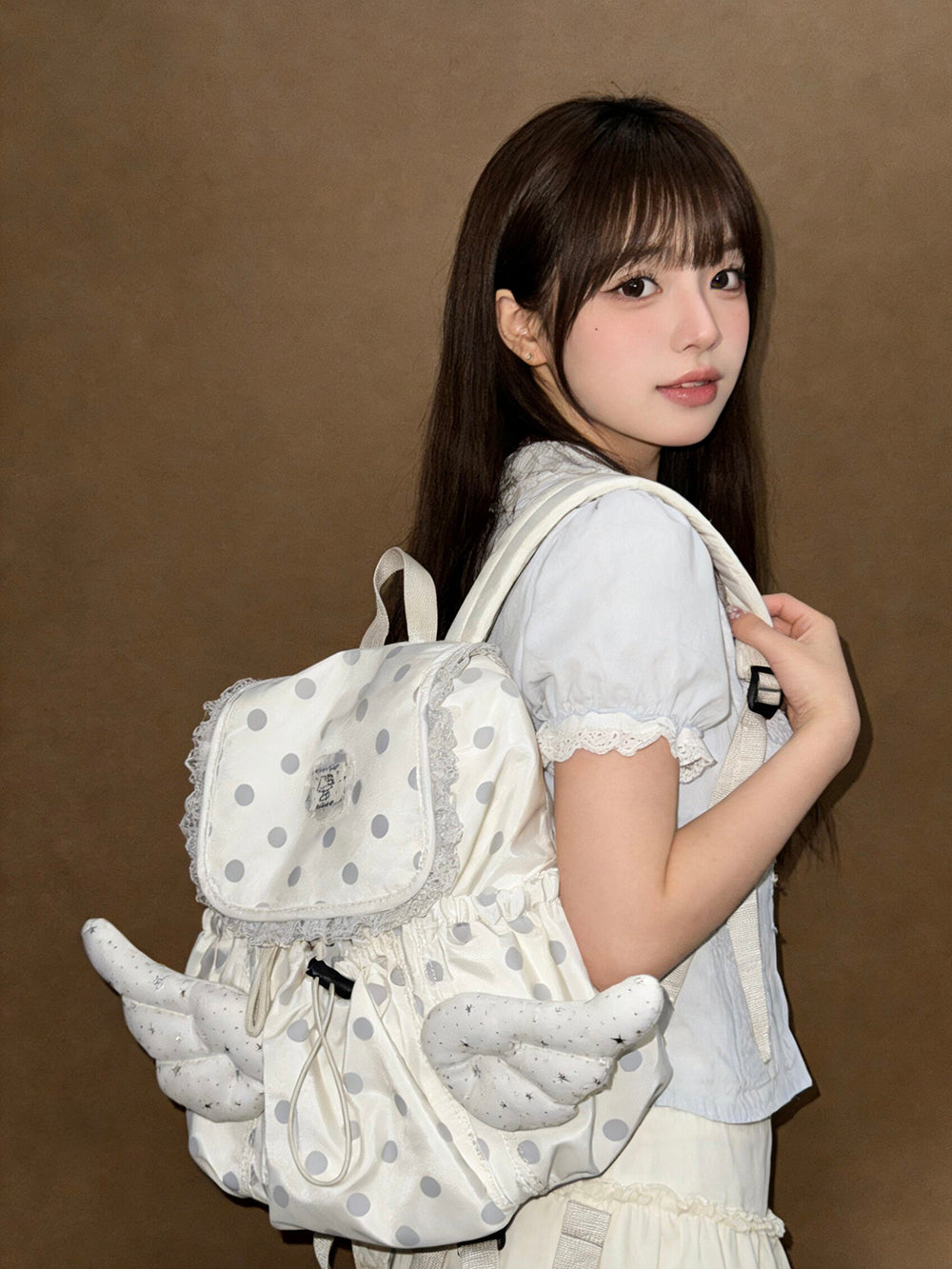 Cream Polka Dot Angel Wings Drawstring Backpack