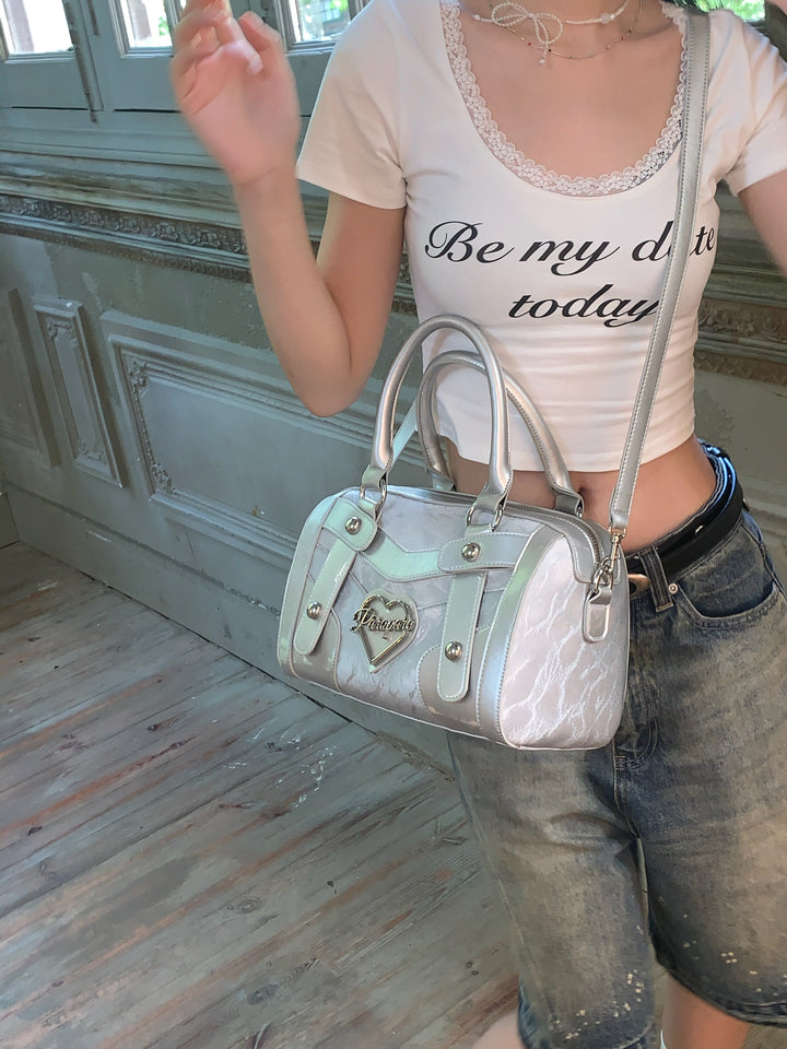 Chic Silver Metallic Handbag with Heart Emblem