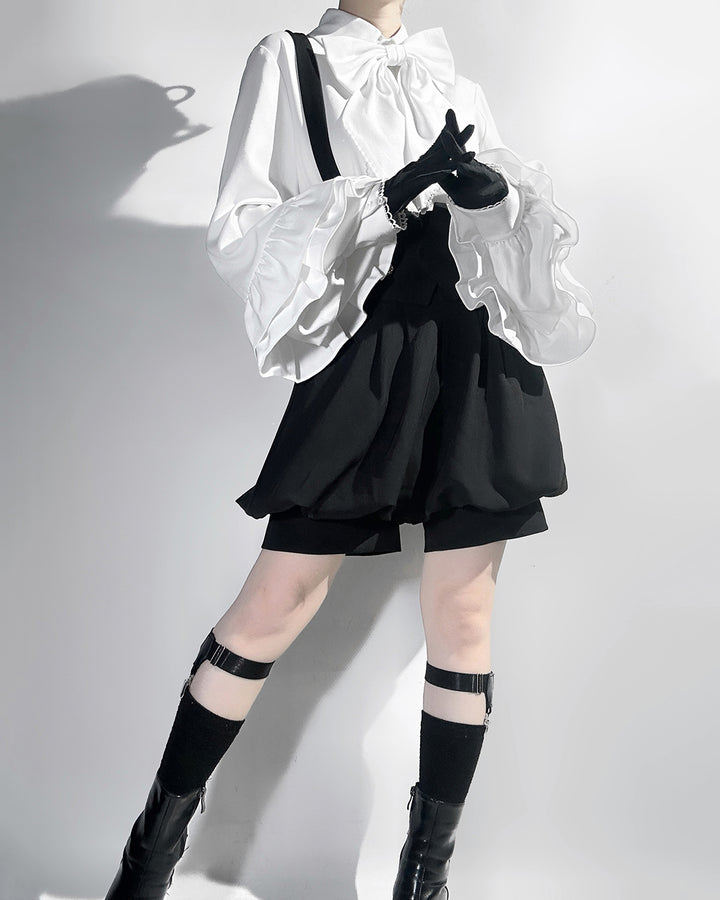 Stylish Black High-Waisted Suspender Shorts with Flared Skirt Overlay