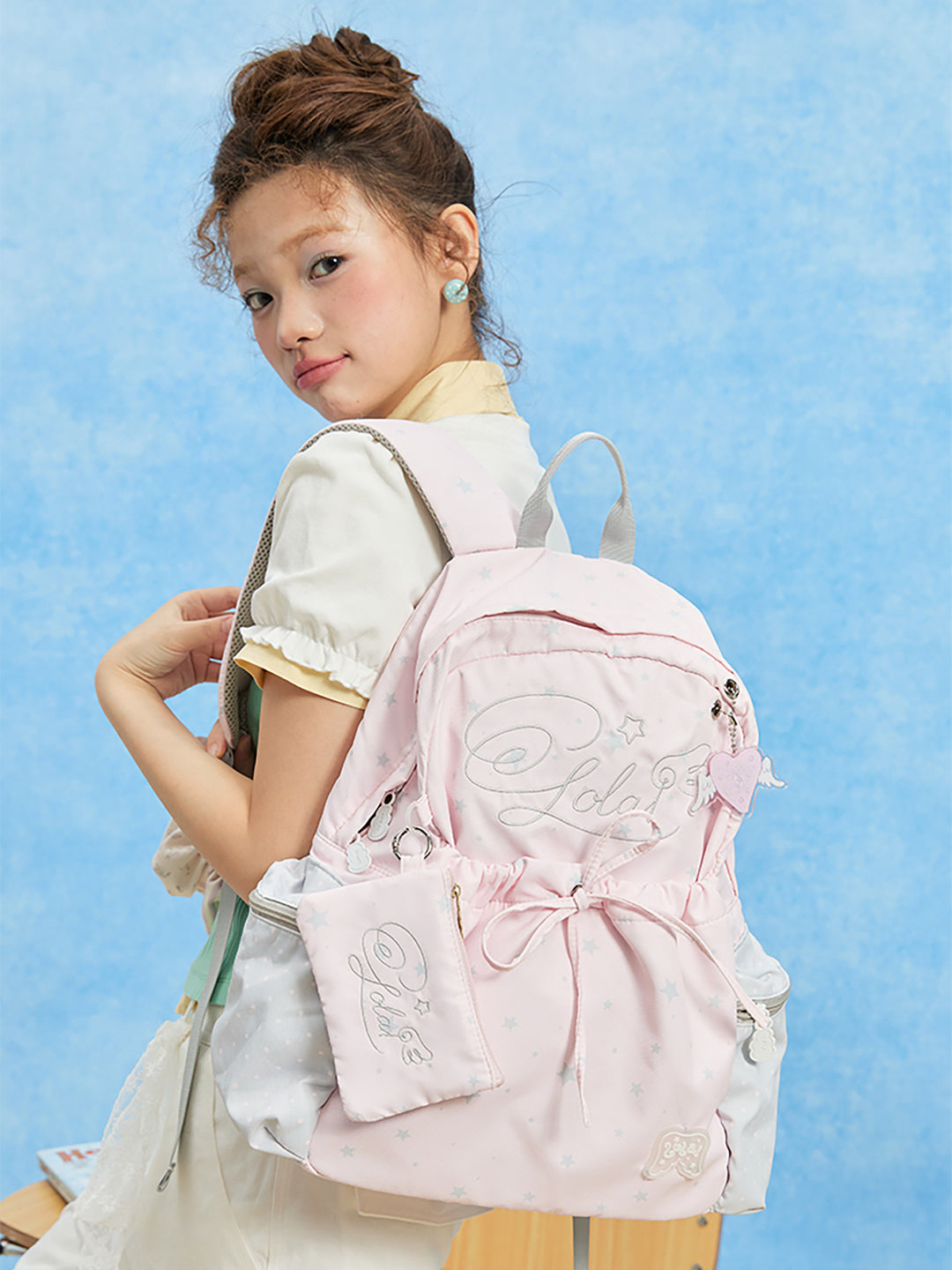 Patterned Backpack with Drawstring Pocket and Card Pouch