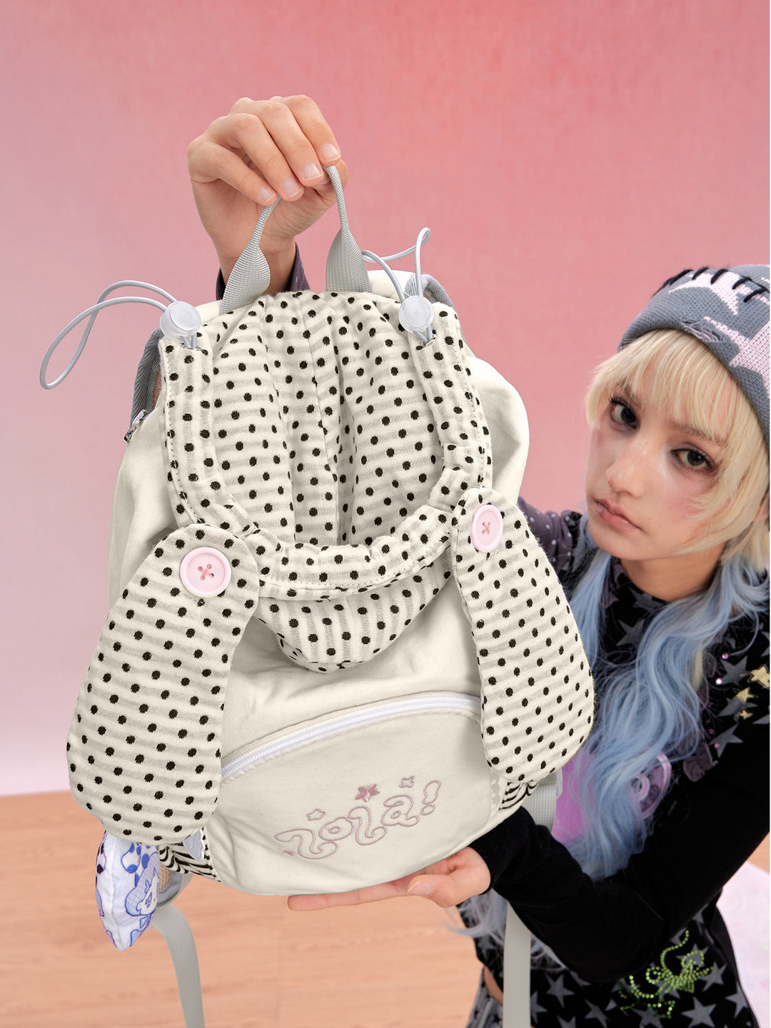 Hat-Inspired Backpack with Front and Side Zip Pockets