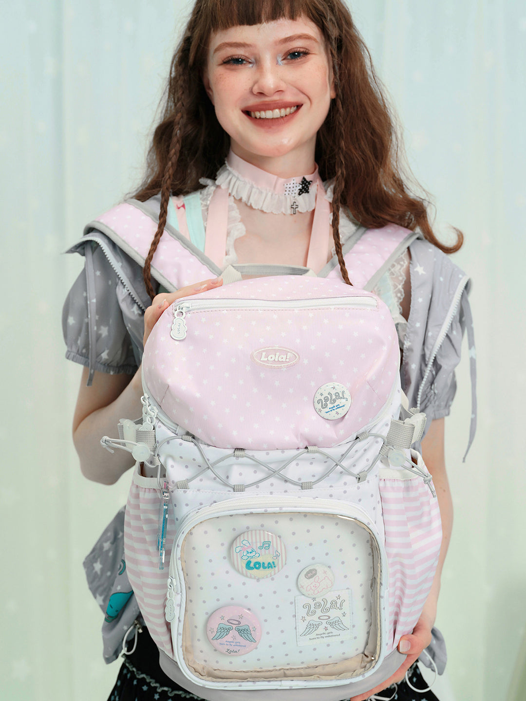 Ita Backpack with Clear Display Pocket and Cord Detail