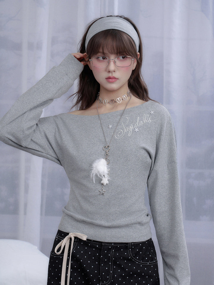 Star Script Off-Shoulder Long Sleeve Top