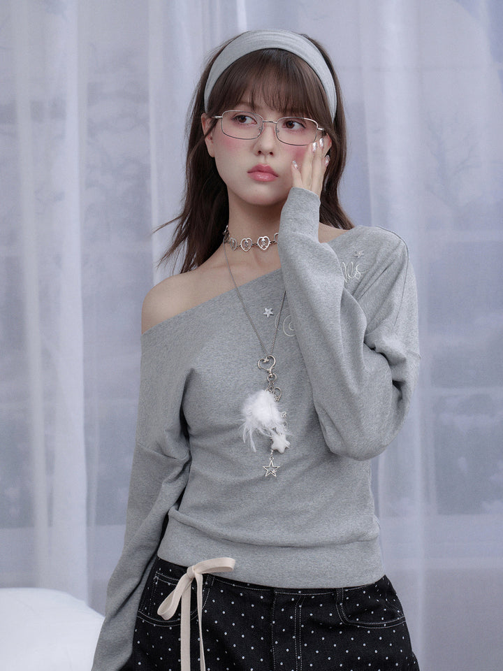 Star Script Off-Shoulder Long Sleeve Top