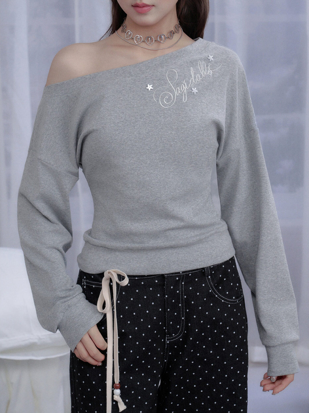 Star Script Off-Shoulder Long Sleeve Top