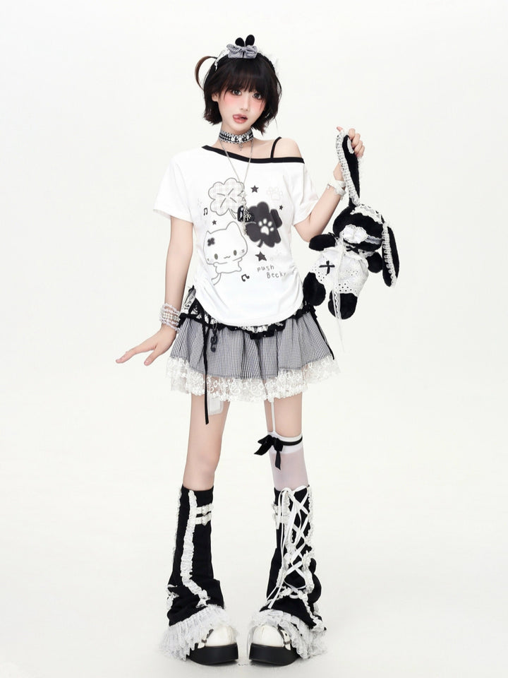 Model wearing a white and lime green Cyber Y2K kawaii anime graphic tee with an asymmetric neckline and cartoon kitten print.